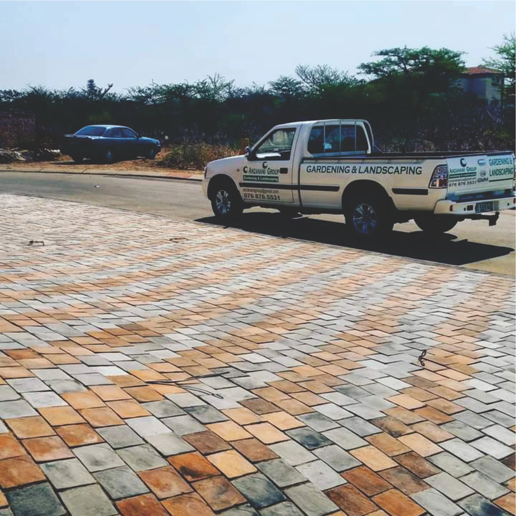 Newly installed paved stone driveway and patio area